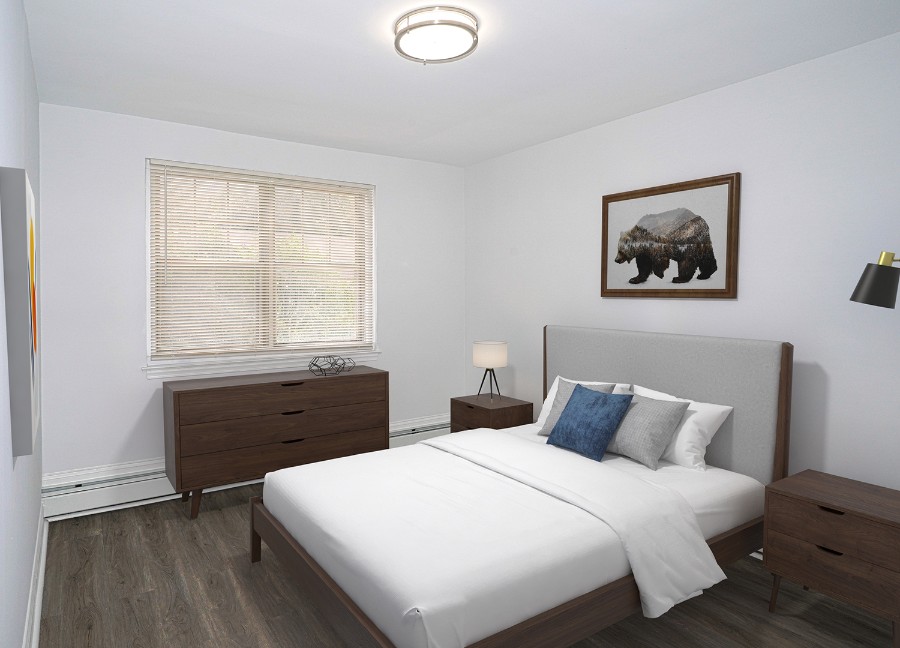 staged bedroom with wooden furniture