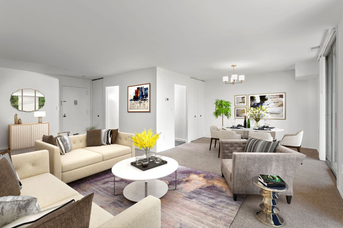 staged room with sitting area and dining table