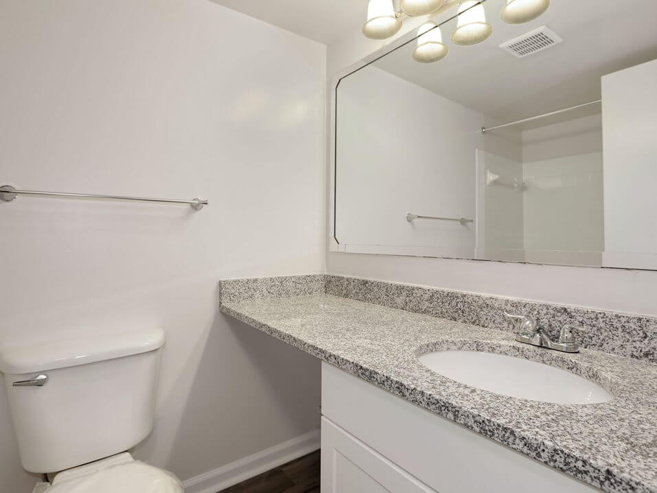 bathroom with granite top