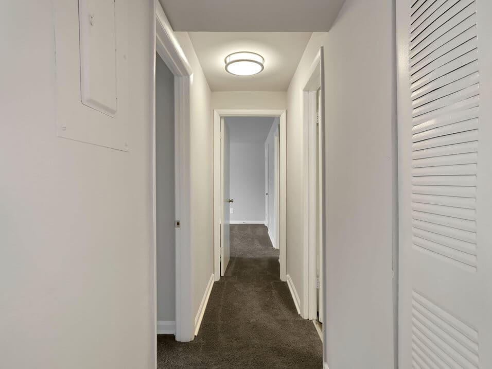 hallway with many doors